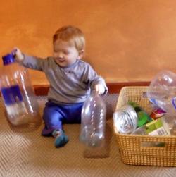 T  14 months playing with plastic bottles.jpg