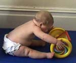 R sitting reaching forwards.jpg