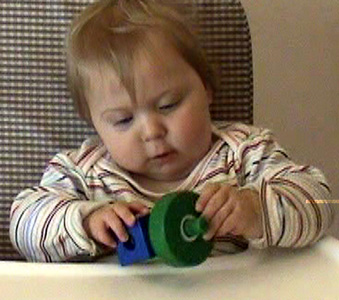 12m pulls toys apart.jpg