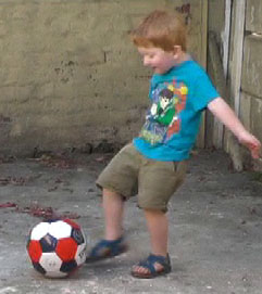 T 3y 2m kicking ball 5.jpg